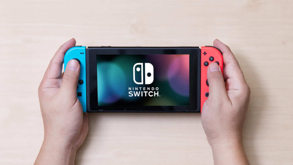 person playing on nintendo switch